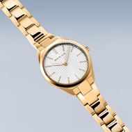 Foto de Reloj Ultra Slim esfera blanca y color tono oro 31mm