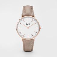 Foto de Reloj de mujer Boho Chic rosado y correa de cuero camel