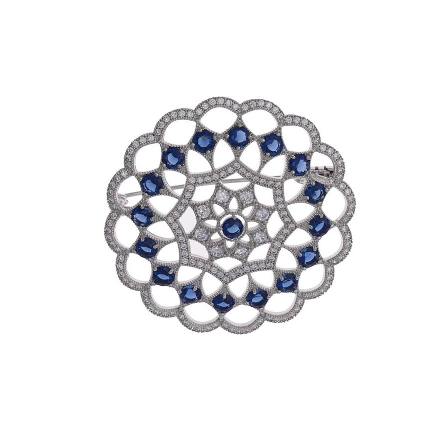 Foto de Broche Rosetón de plata y circonitas blancas y color zafiro