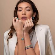 Foto de Anillo de plata con baño de rodio con piedra turquesa