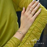 Foto de Pulsera de plata rodiada con eslabones oval y motivo centro bicolor