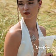 Foto de Gargantilla y broche de plata rodaida con filigrana de flores en circonitas blancas brillantes