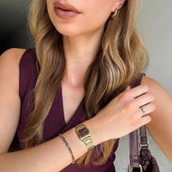 Foto de Reloj Gracieuse dorado con esfera burdeos