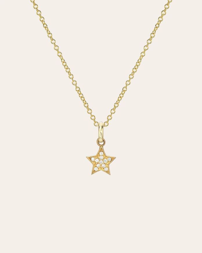 Foto de Colgante estrella de oro amarillo y circonitas 18kt 