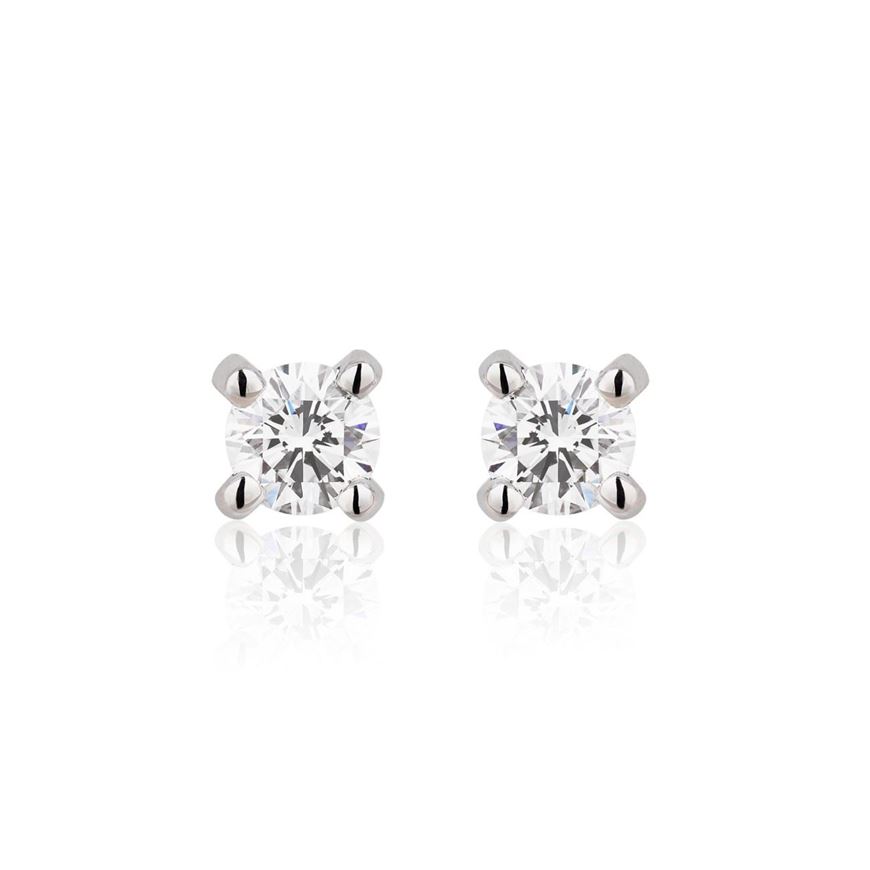 Foto de Pendientes de bebé punto de luz en oro blanco 18kt y circonitas talla brillante