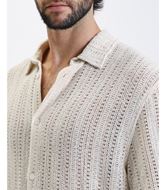 Foto de Camisa bowling de punto entramado beige