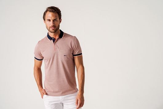Foto de Polo estmpado geometrico naranja y marino