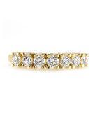 Foto de Sortija en oro amarillo 18kt y 7 circonitas blancas brillantes engastadas en garras