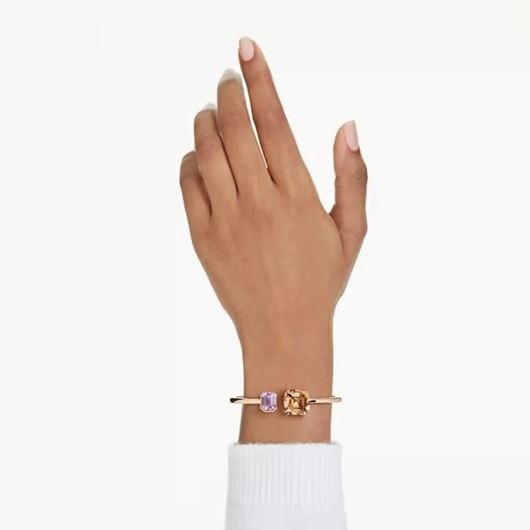 Foto de Brazalete Millenia baño tono oro talla octogonal color caramelo talla M y morado