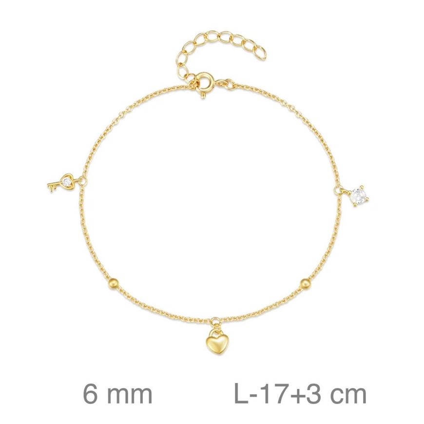 Foto de Pulsera de plata baño de oro con llave, corazón y circonita