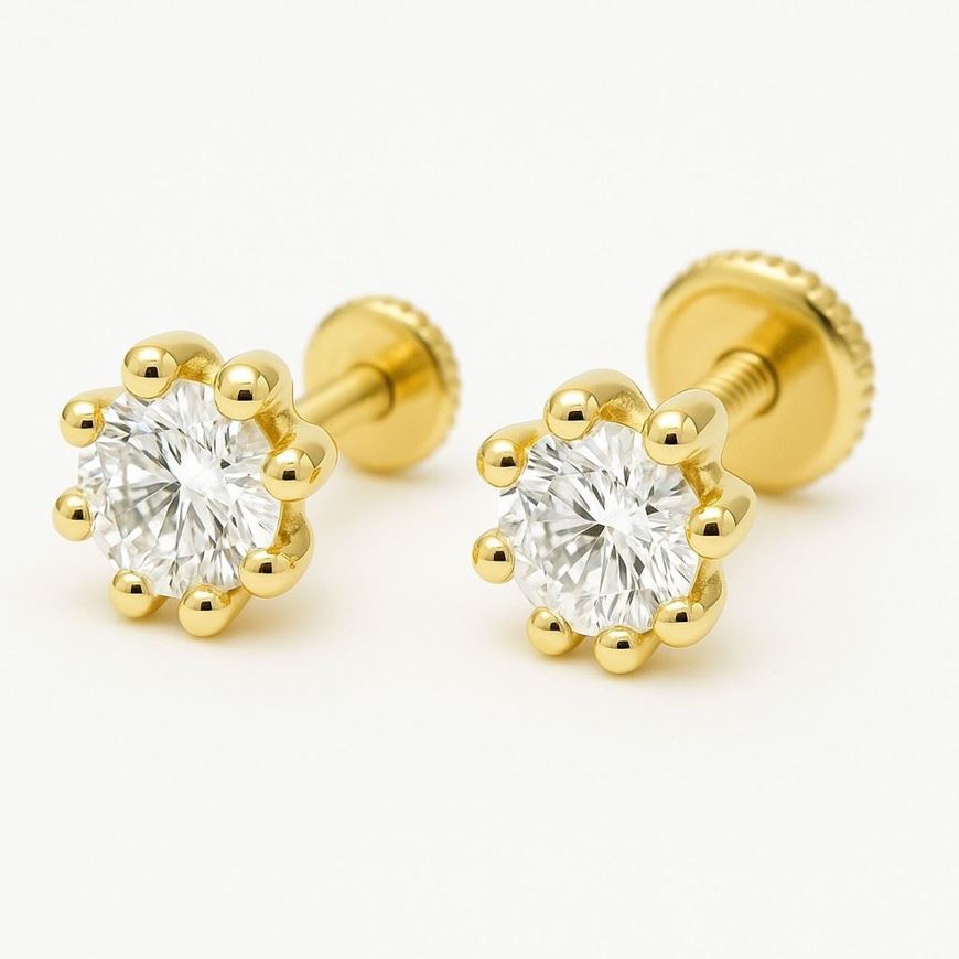 Foto de Pendientes de bebé Puntos de luz de 8 garras en oro amarillo 18kt y circonitas blancas
