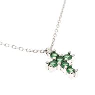 Picture of Cruz de oro blanco 18kt y circonitas verde esmeralda