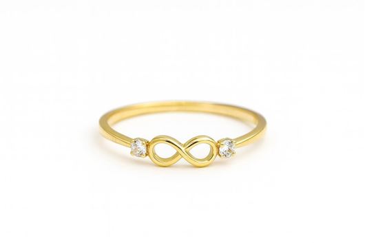Foto de Anillo oro amarillo 18 kt con circonitas e infinito