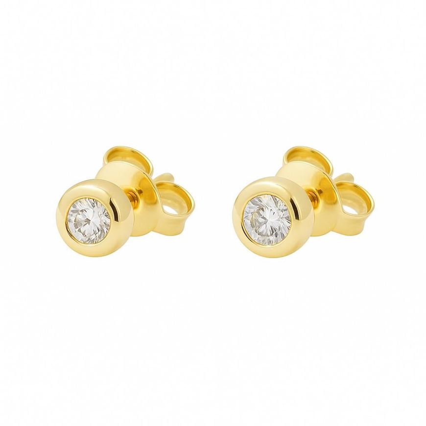 Foto de Pendientes punto de luz en oro amarillo y dos brillantes 0,12 ct