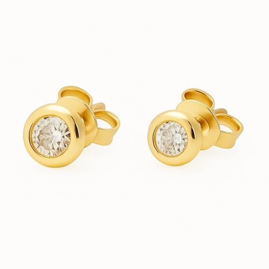 Foto de Pendientes punto de luz en oro amarillo 18 kt con dos brillantes 0,16 ct