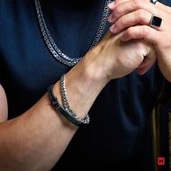 Foto de Pulsera cuero trenzado y placa de acero en negro 20cm