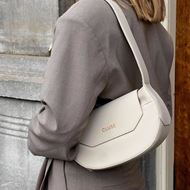 Foto de Bolso cruzado Cluse Sacroisé Petite beige y detalles dorados