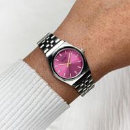 Foto de Mini reloj retro de los años 70, de acero, color fucsia y plateado