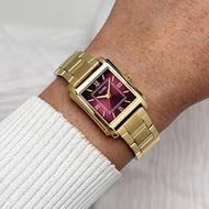 Foto de Reloj Anglée de acero, color cereza oscuro y dorado