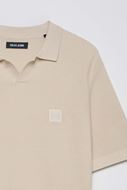 Foto de Polo manga corta en punto textura beige